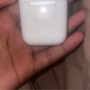 Airpod case with right airpod.